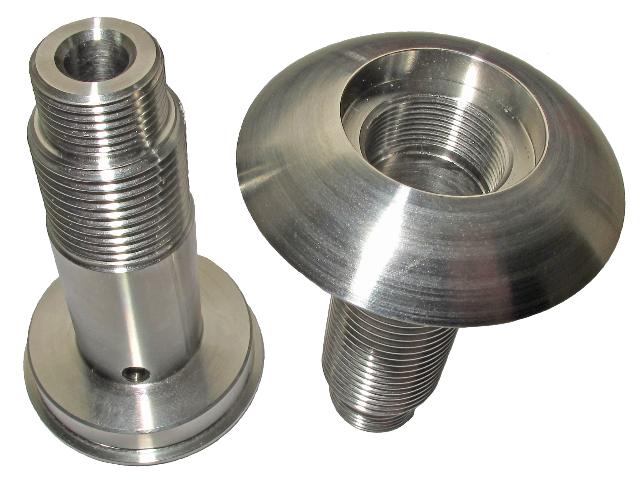 Two precision turned stainless steel components